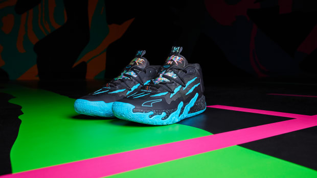 Side view of LaMelo Ball's black and blue PUMA sneakers.